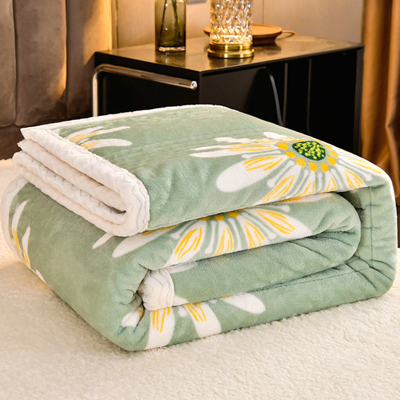 Quilted sherpa blanket with green daisy print