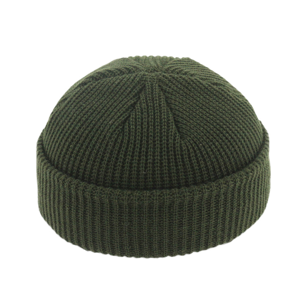 Short ribbed docker beanie with turn-up cuff