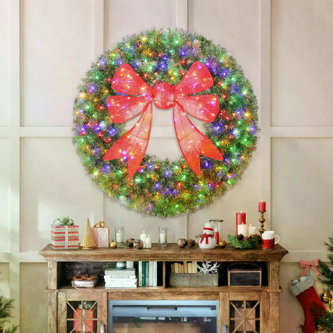 Giant lit Christmas wreath with red bow