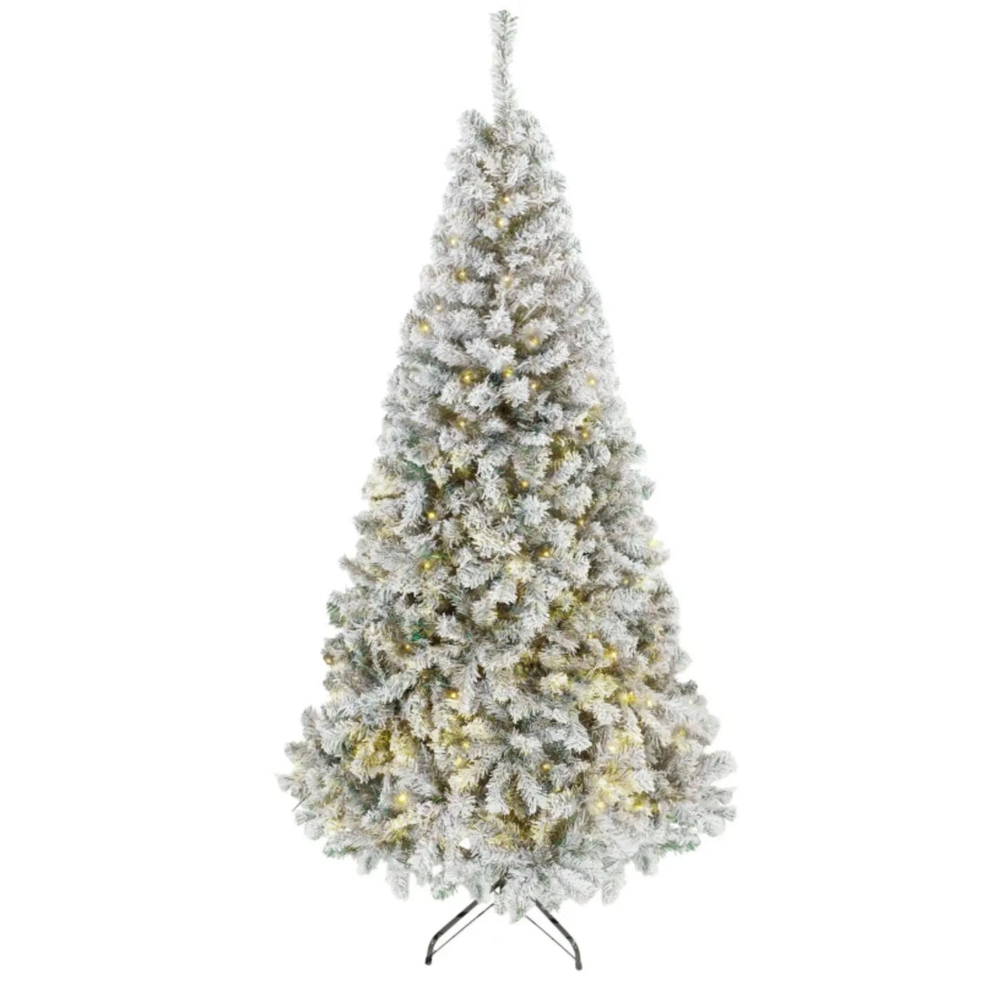 Tall flocked fir with warm lights