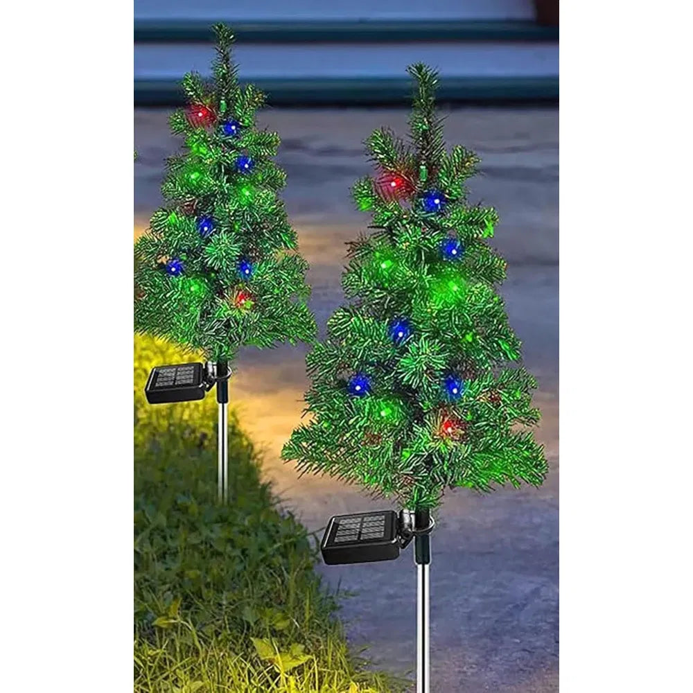 Solar Christmas tree stake lights in garden