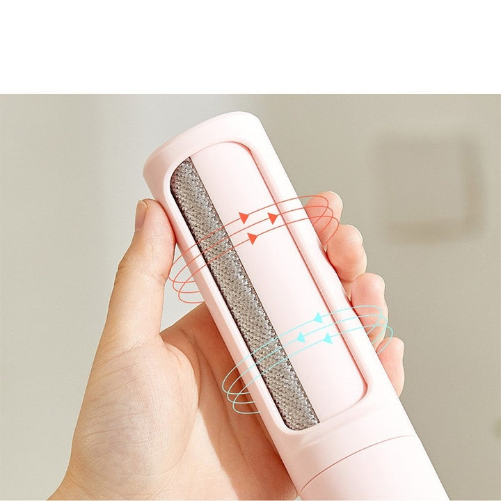 Pet hair remover brush on grey sofa