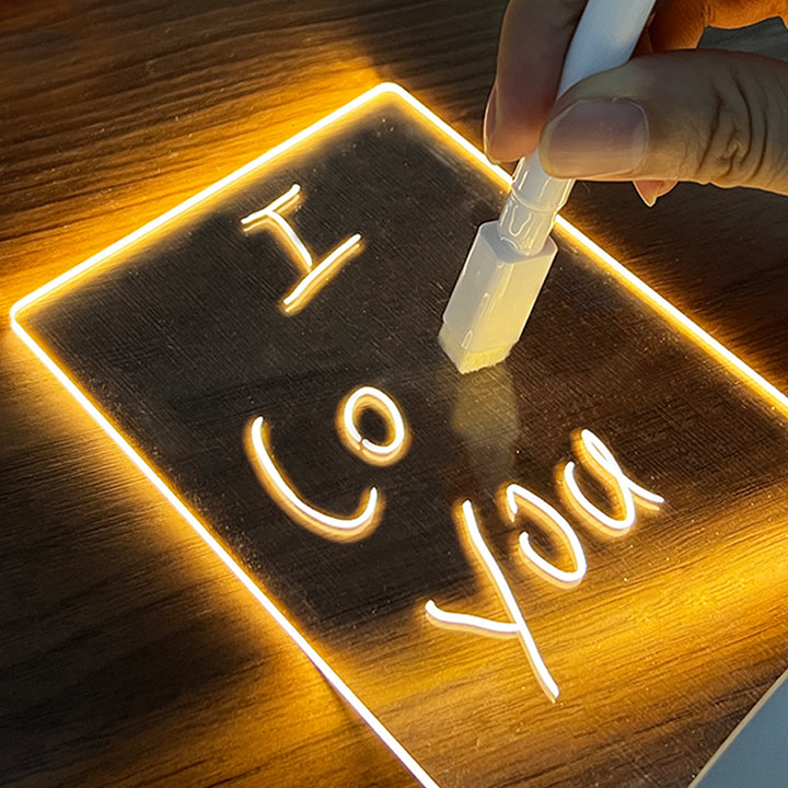 Glowing acrylic message board on wooden base