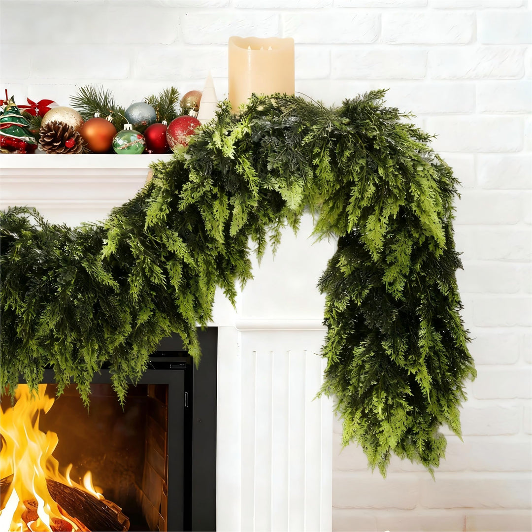 Green Norfolk pine garland on a mantelpiece