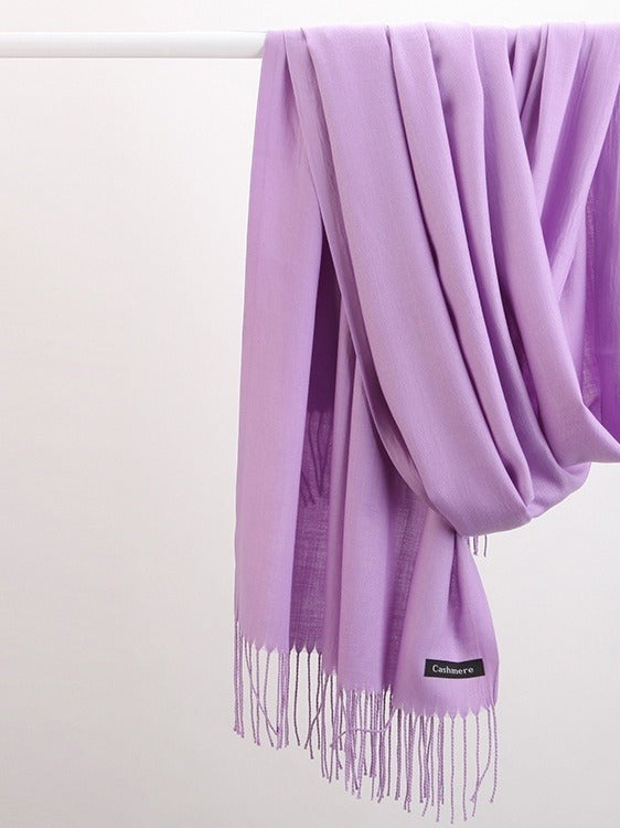 Woman in soft fringed scarf