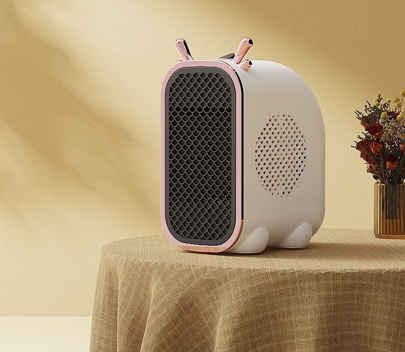 Small white fan heater with ear design