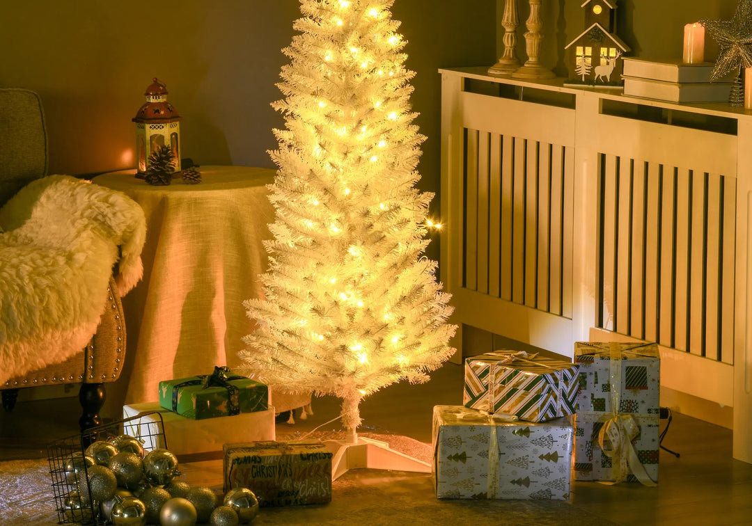 Small white pencil tree with warm lights