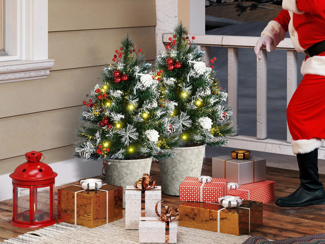 Pair of decorated battery porch trees