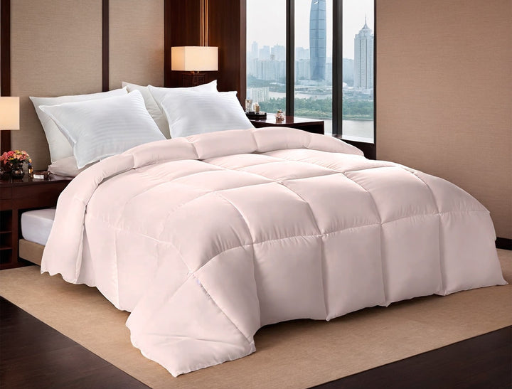Pink box-stitched duvet on bed