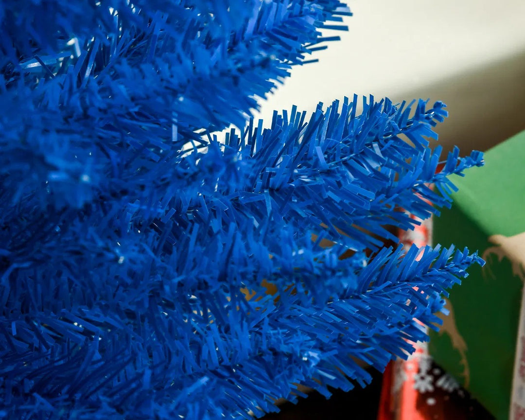 Blue slim pencil Christmas tree, unlit