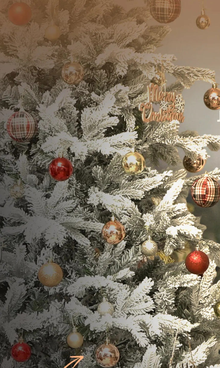 Large snow-flocked full spruce Christmas tree