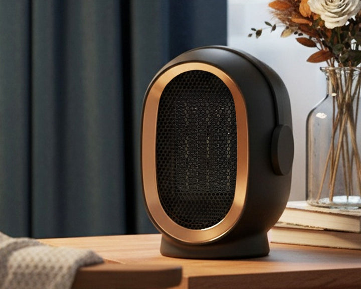 Black compact ceramic fan heater