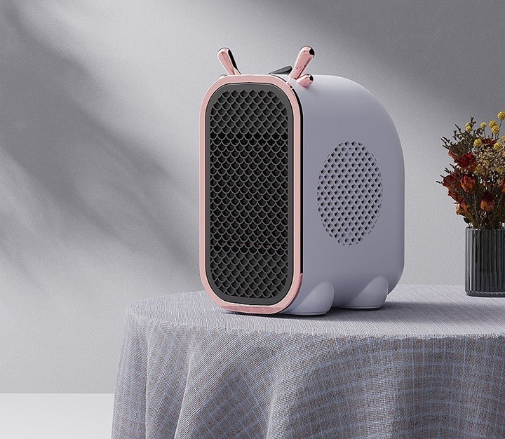 Small white fan heater with ear design
