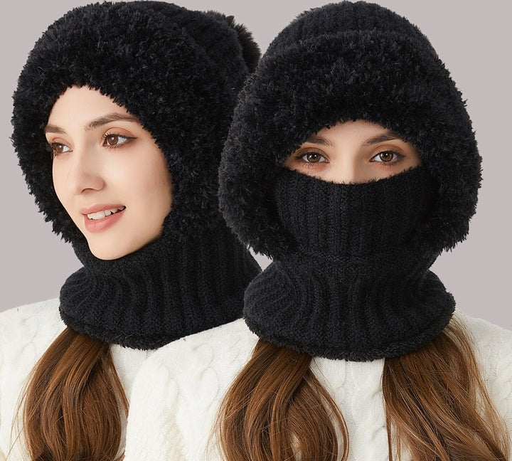 Woman wearing knitted hood with scarf