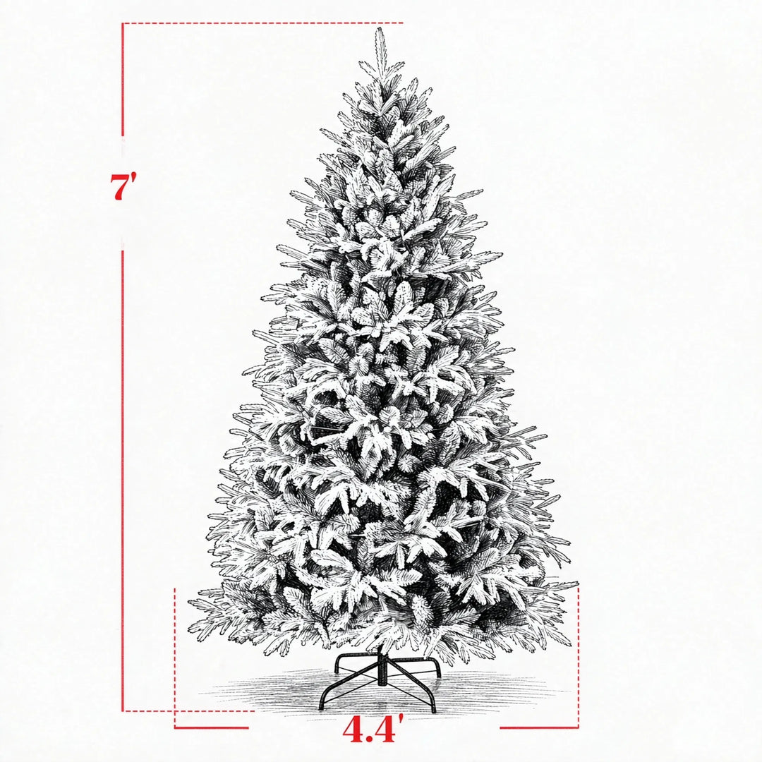 Full snow-flocked tree with warm LEDs
