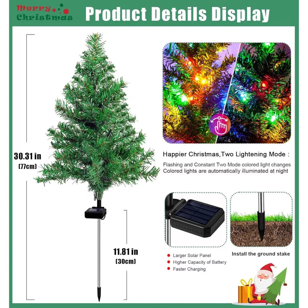 Four solar mini Christmas trees lit on lawn