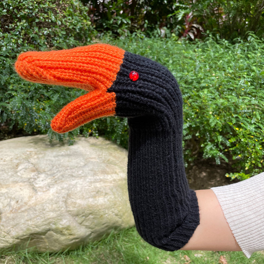 Knitted white goose head mittens