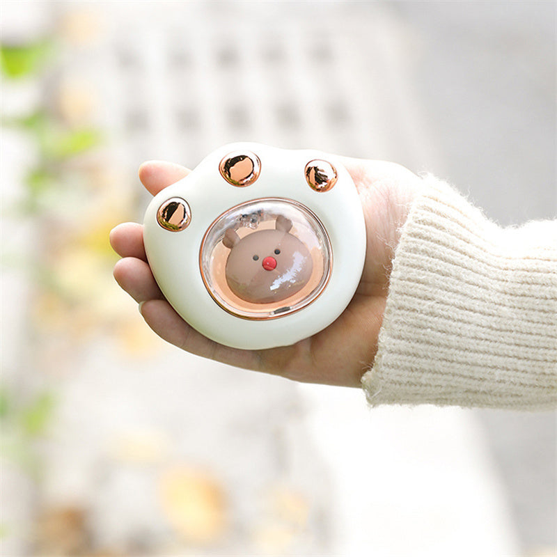 Cat-paw rechargeable hand warmer in hand