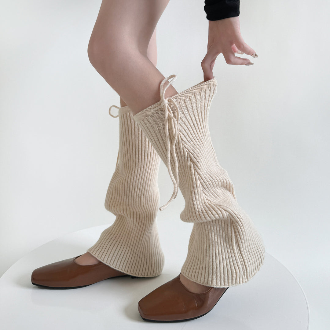 Pink flared ribbed leg warmers with tie