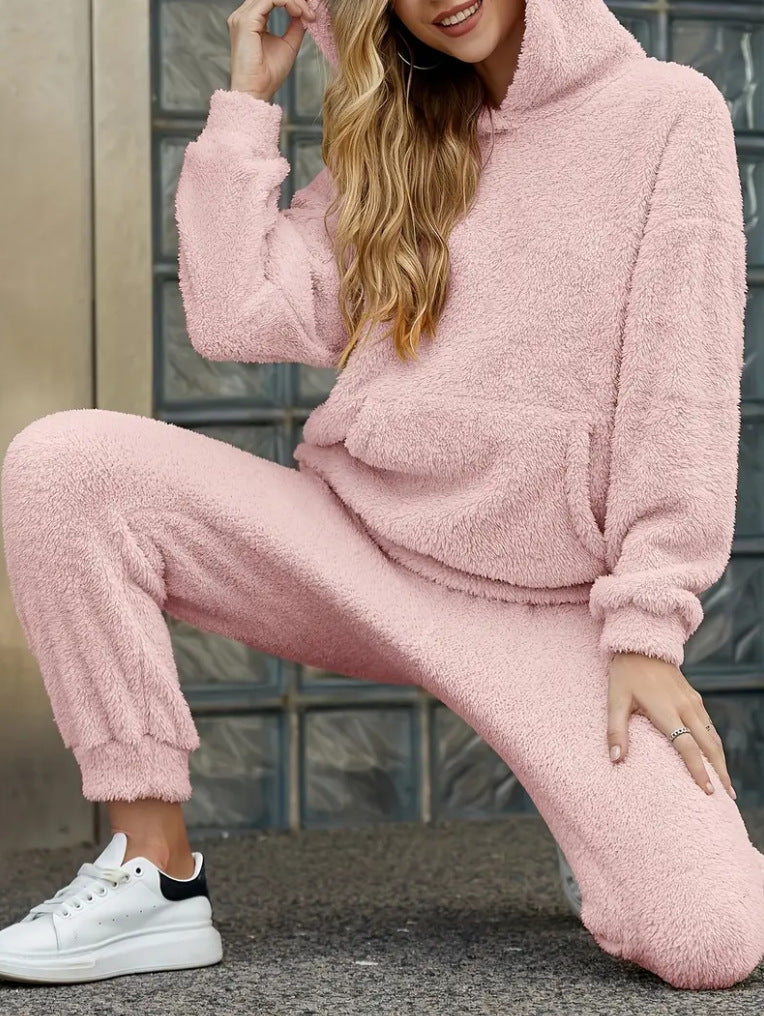 Woman in fluffy teddy hoodie and trousers