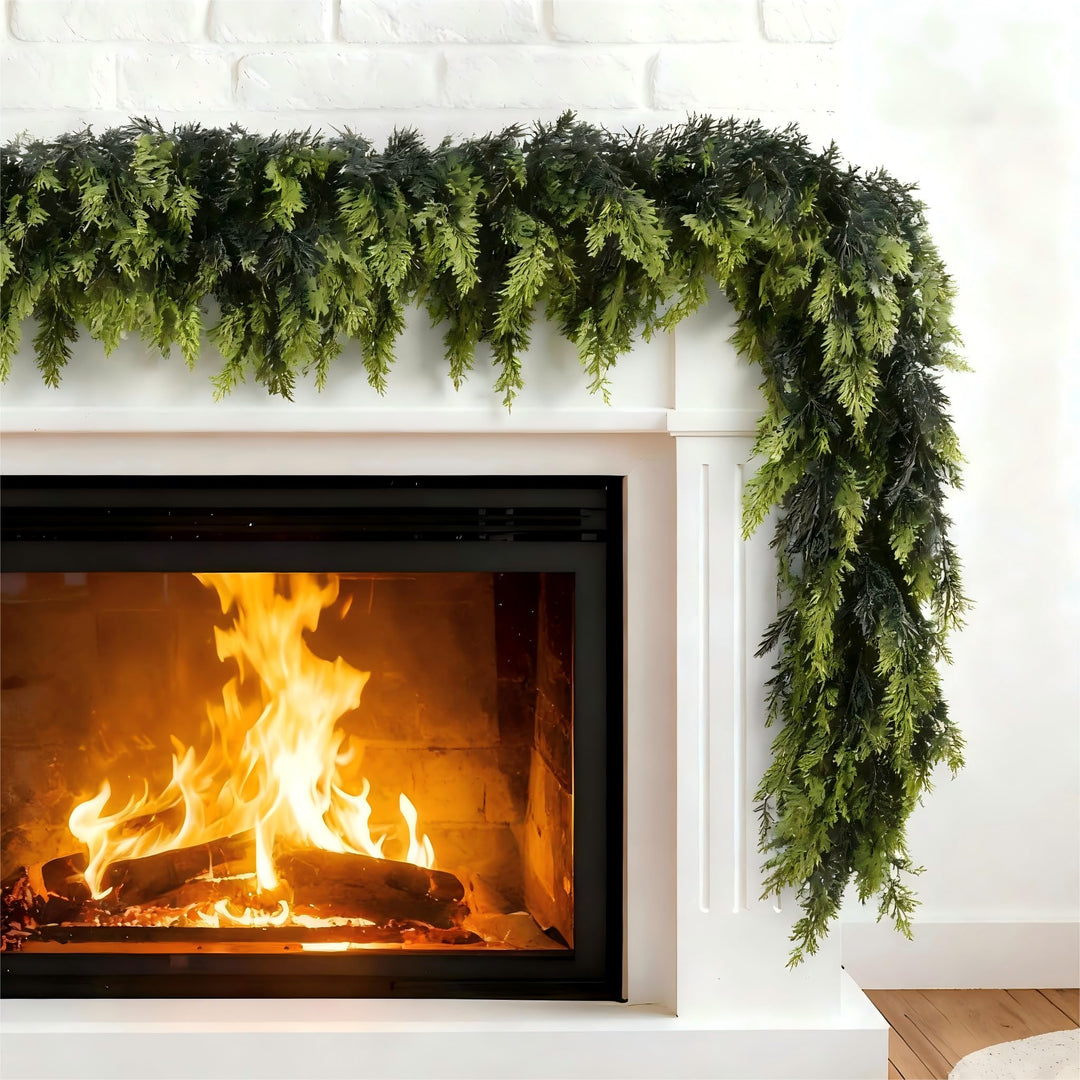 Green Norfolk pine garland on a mantelpiece