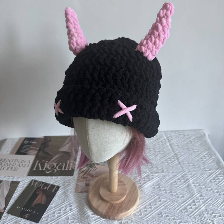 Black crochet bucket hat with pink horns