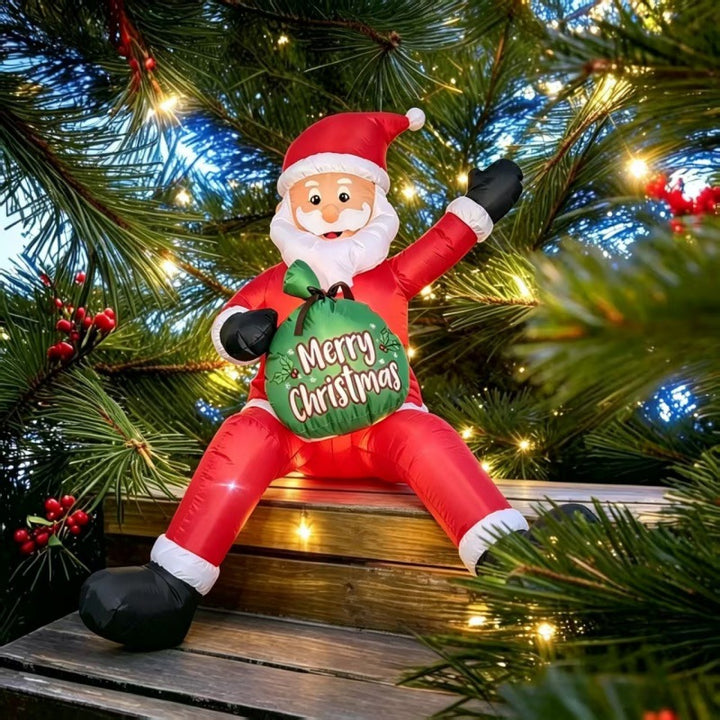 Giant inflatable Santa with gift sack in garden