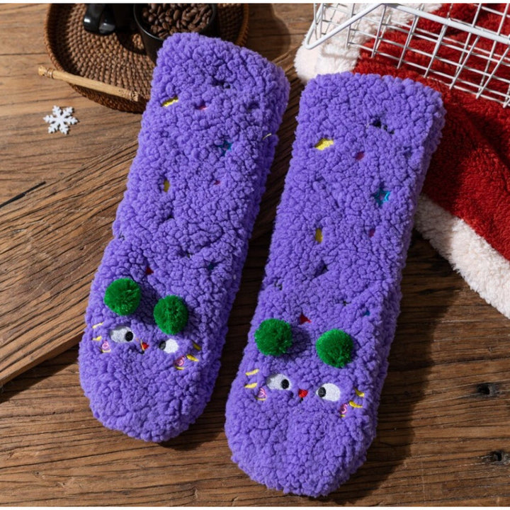 Fluffy yellow socks with embroidered face and pompoms