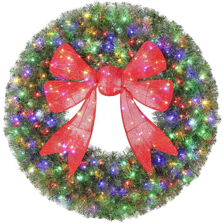 Giant lit Christmas wreath with red bow