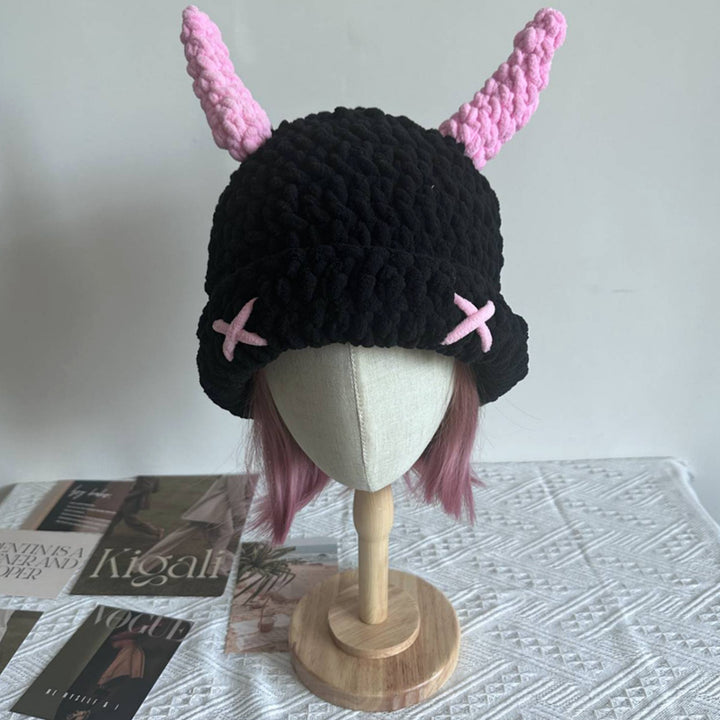 Black crochet bucket hat with pink horns