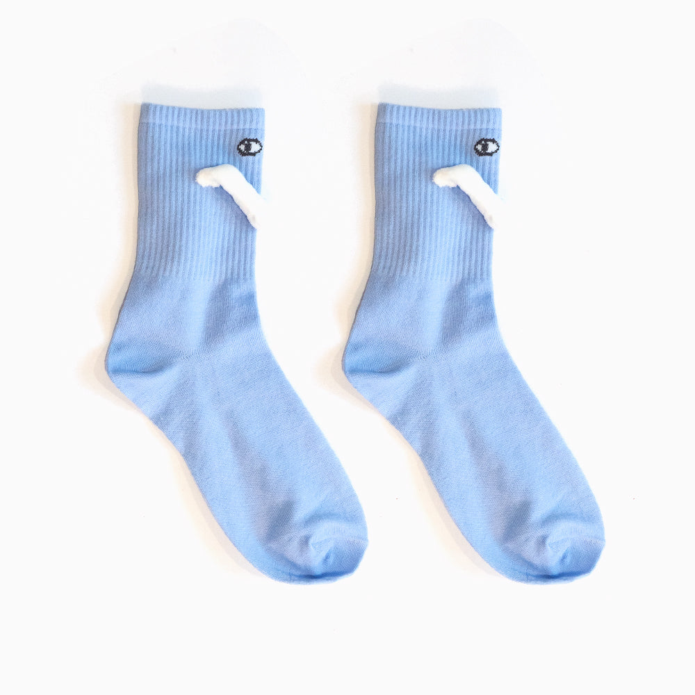 Two socks with magnetic hands holding each other