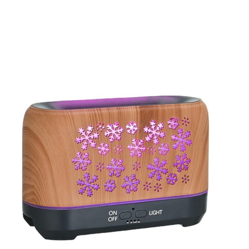 Snowflake flame diffuser with orange mist