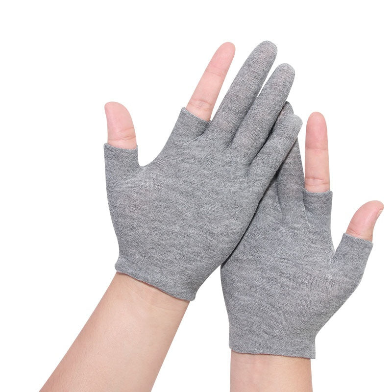 Grey cotton half-finger gloves on hands