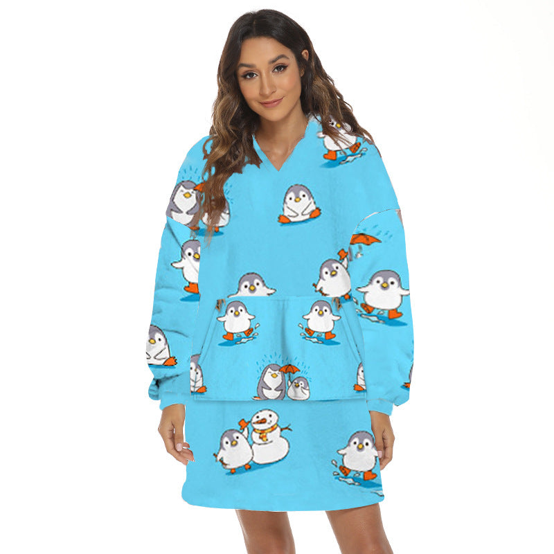 Person wearing oversized panda hooded blanket