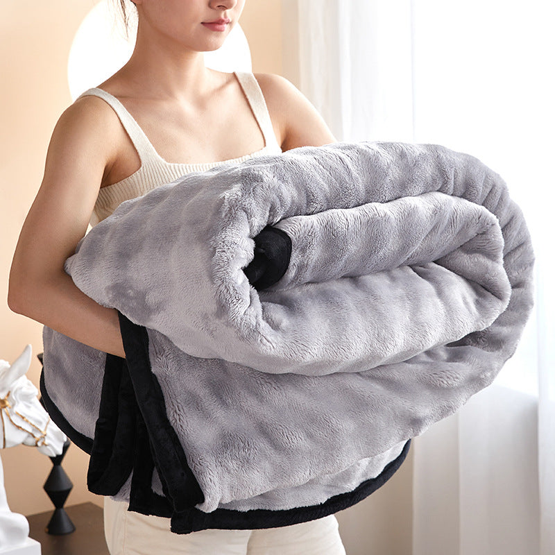 Sage green bubble fur blanket with black trim