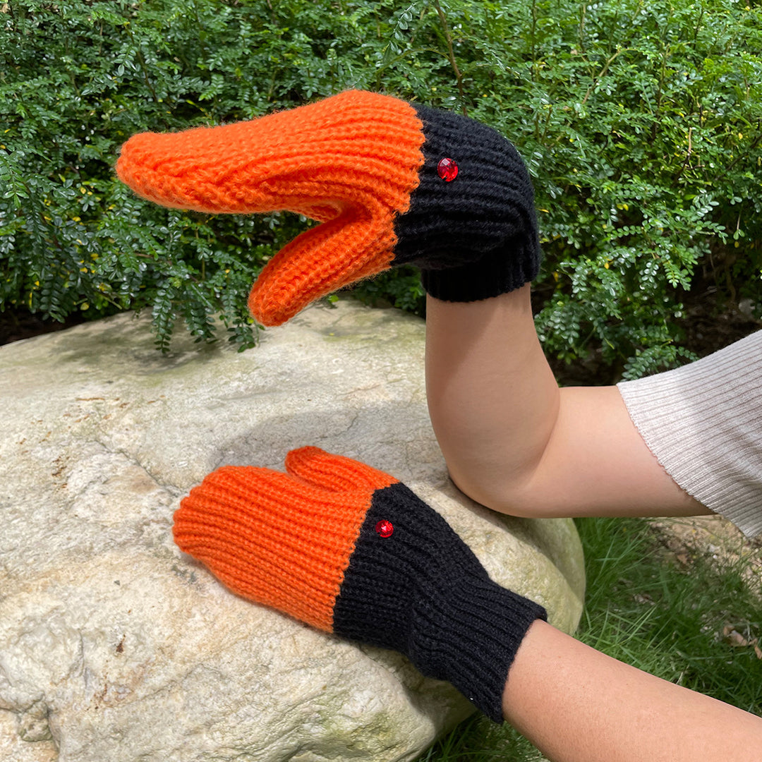 Knitted white goose head mittens